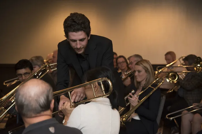 Equipo corporativo durante Orchestrate!, actividad de integración